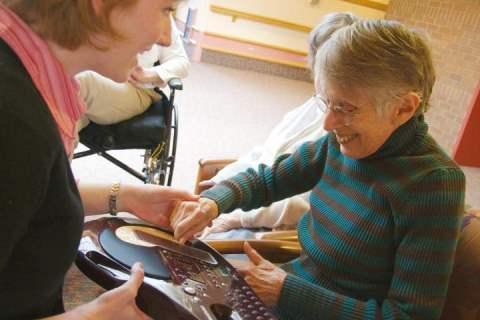 image of dementia patient with carer