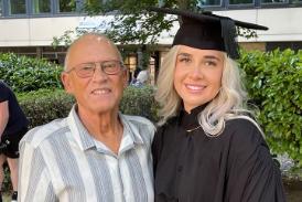 A profile picture of student Lorna on her graduation with her grandad