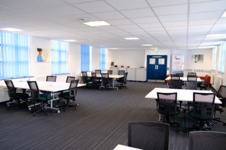 Photograph of DHEZ desks in office collaboration space