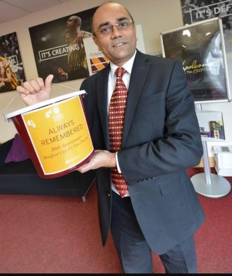 Ajay Mahajan with fundraising bucket