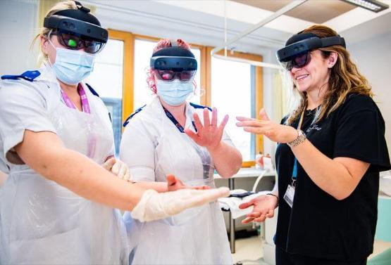 Students using new Augmented Reality HoloLens headsets