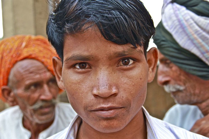 Indian man looking into camera