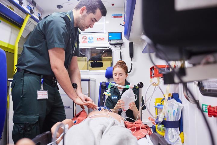 Two Paramedic Science students in an ambulance