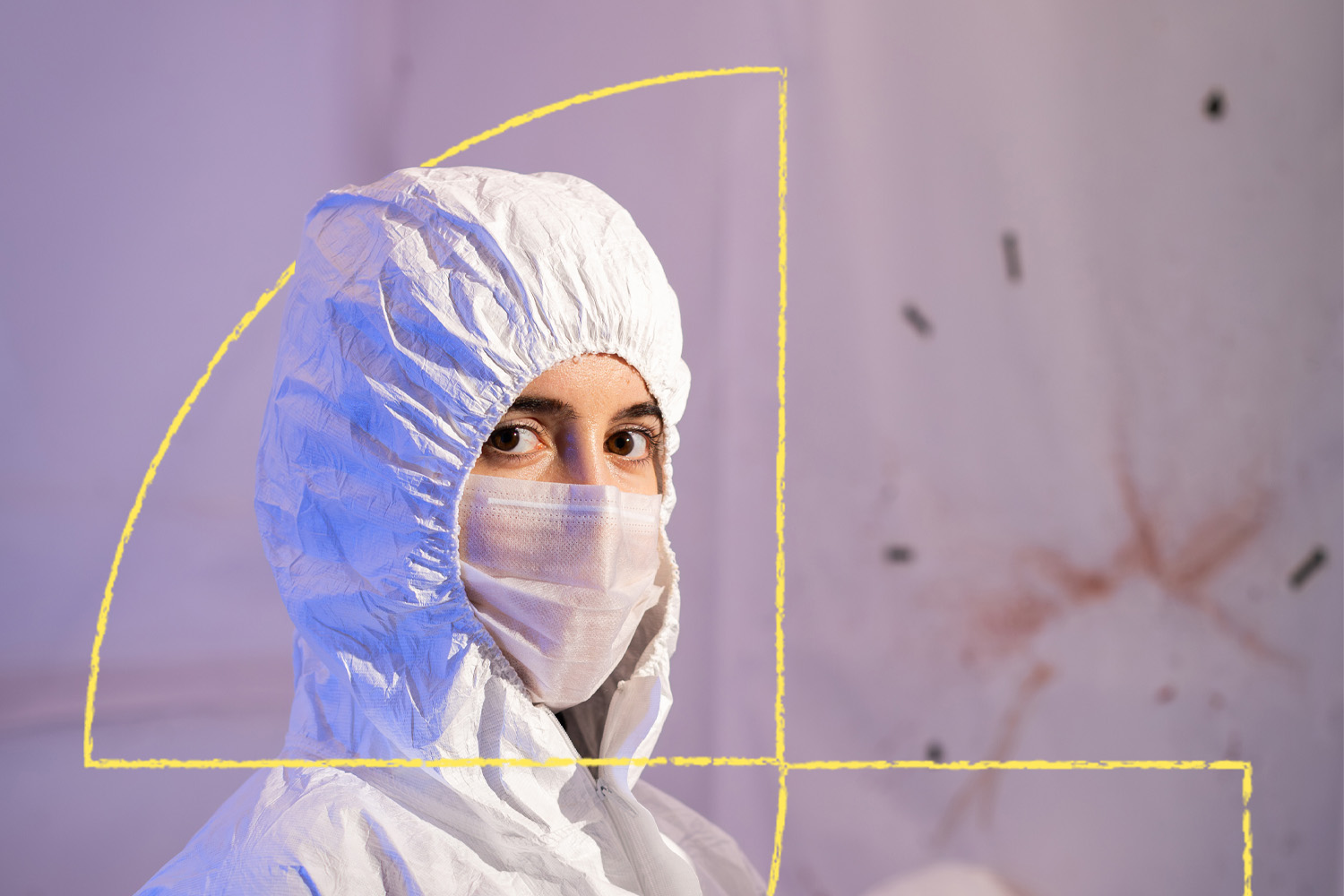 A forensic student collecting crime scene samples on a mock crime scene.