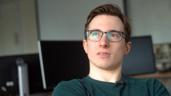 head and shoulder picture of a person wearing glasses sat down looking into the distance head and shoulder picture of a person wearing glasses sat down looking into the distance