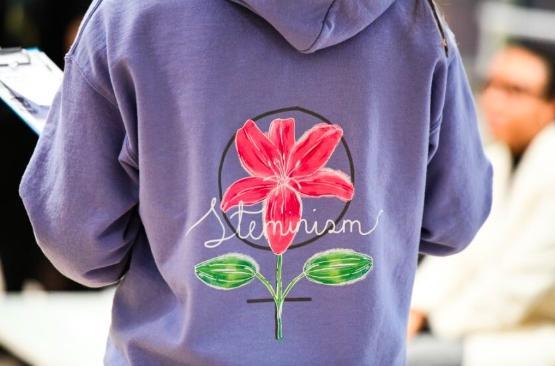 Beck of a sweatshirt featuring STEMinism logo Beck of a sweatshirt featuring STEMinism logo