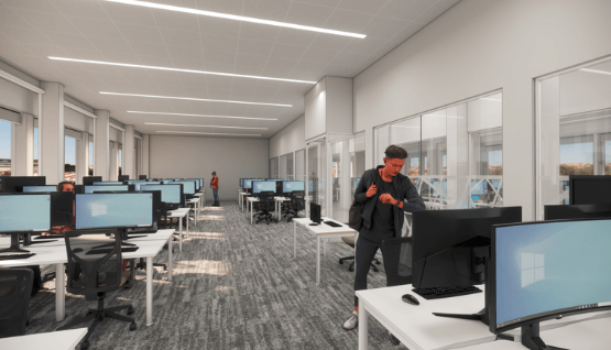 Image of new computer suite with banks of computers and modern grey furnishings Image of new computer suite with banks of computers and modern grey furnishings