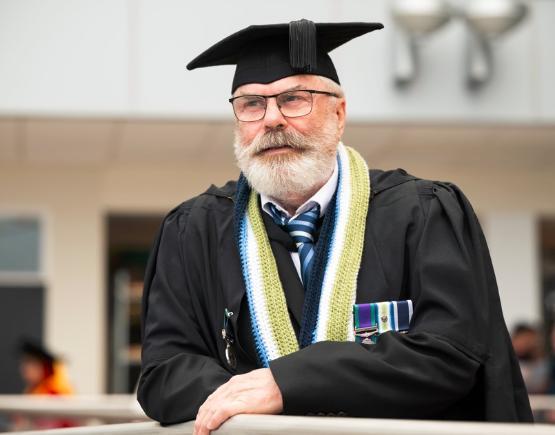 Sean Cahill graduating wearing war medals Sean Cahill graduating wearing war medals