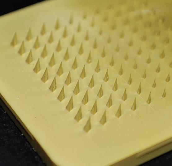 A set of microneedles, which measure less than 1mm across A set of microneedles, which measure less than 1mm across