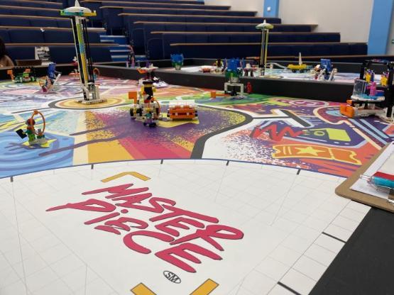 a close-up picture of a table with a number of Lego models on it a close-up picture of a table with a number of Lego models on it