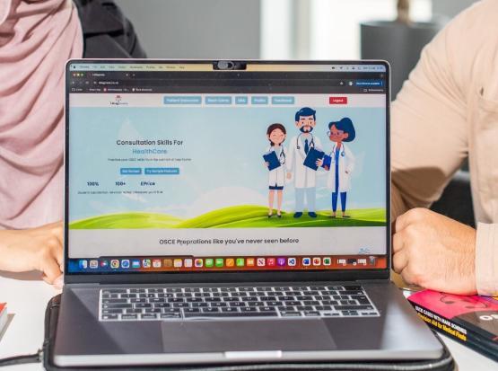 A laptop showing the I-Diagnose homepage A laptop showing the I-Diagnose homepage