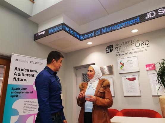 Dr Qun Shao chats to business woman Raza Alsous Dr Qun Shao chats to business woman Raza Alsous