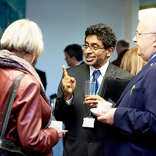 A discussion at a networking event at the University of Bradford