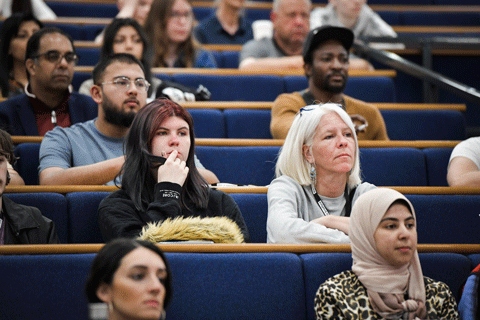 a group of students in a lecture theatre