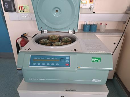 Lab equipment with a sticker to switch off sticker