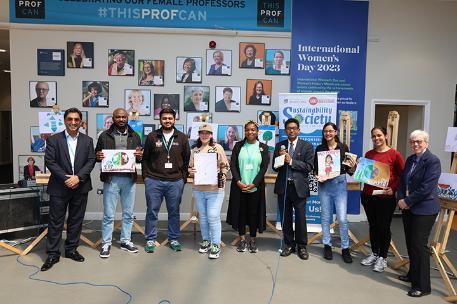 Students posing after awarded certificates for painting