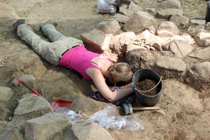 Woman at archaeological dig