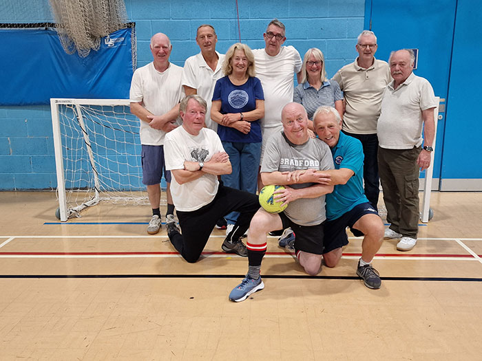 A group of B Tech Chemistry graduates from the class of 1976 returning to the University of Bradford for a reunion. The group participated in walking football