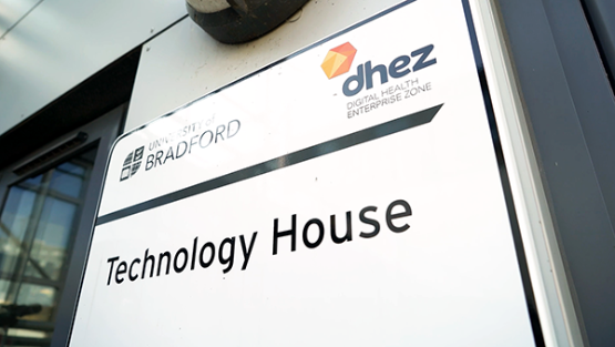 View of the DHEZ Technology house exterior sign