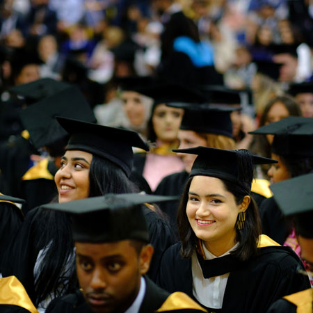 Student sitting in a graduation ceremony