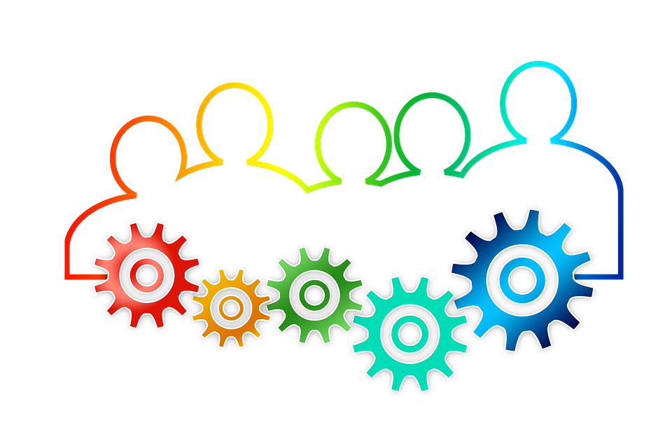 Rainbow outline of people and cogs representing teamwork.