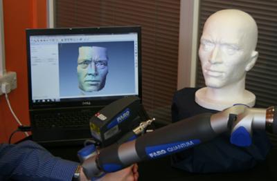 a computer screen showing a laser scan of a model head