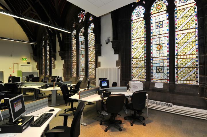 Image of stain glass windows and modern training suite in Sir Titus Salt Building