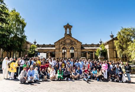Group photo outside Salt Building on Saltaire Heritage Tour
