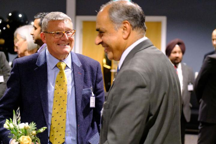 A photo of a person networking at the alumni networking event