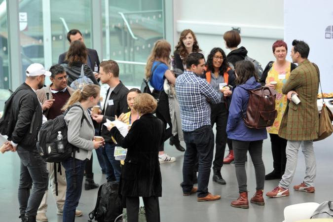 People talking in the Richmond Building Atrium, at the Channel 4 Diversity Conference on 17 June 2019