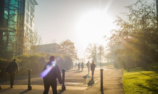 Students walking around University of Bradford campus