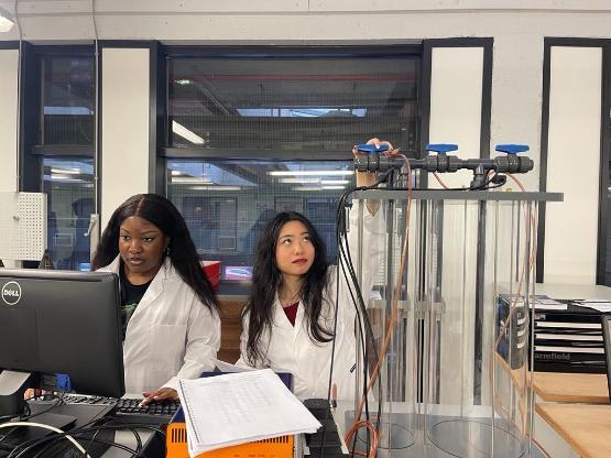 Chemical engineering students Lola Olugunwa and Patricia Goeyardi in the lab