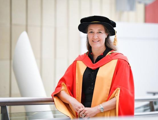 Kate Hall receiving her honorary doctorate