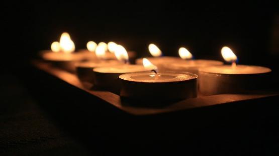Tea light candles in a dark room