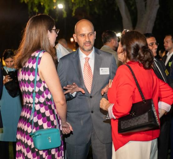 Professor Zahir Irani talking to guests at event in Dubai
