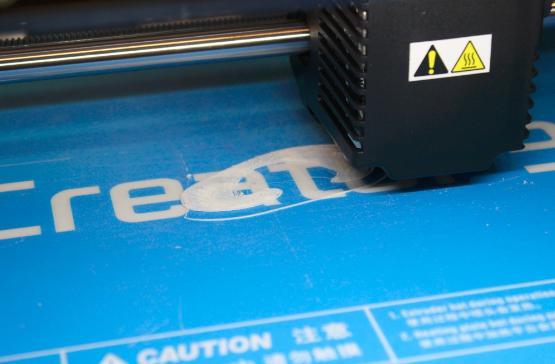 A 3D printer printing an ear