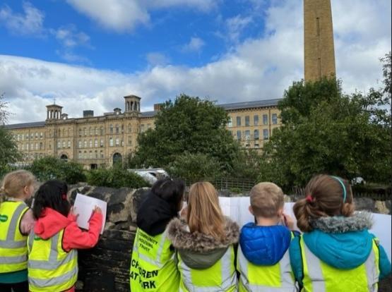 Pupils from Wycliffe Primary School, Saltaire drawing Salts Mill