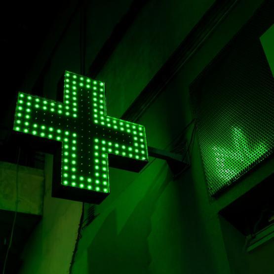 Pharmacy sign in neon green