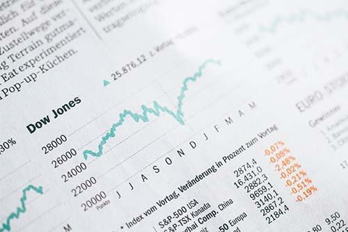 Paper showing financial market information 