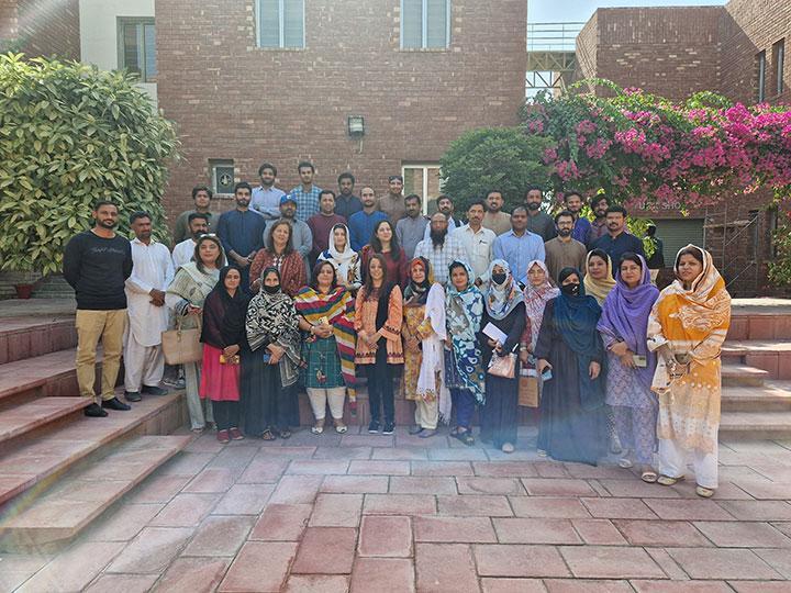 Group photo of Dr Samina Karim and a cohort of social workers training for a UNICEF project in Pakistan