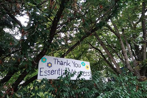 Sign saying thank you essential workers 