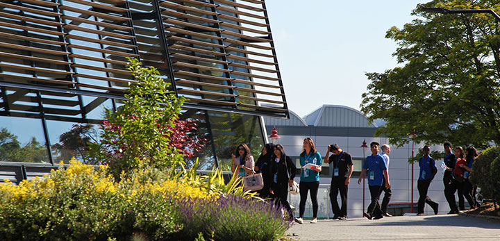 A campus tour walking past the Bright Building on a Postgraduate Open Event