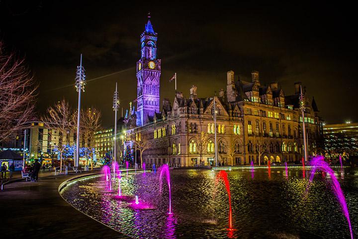 Bradford City Park and Mirror Pool lit up a night
