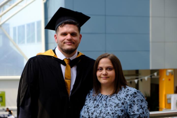 An image of husband and wife, Anthony and Pamela Richardson, on the day of Anthony's Graduation.