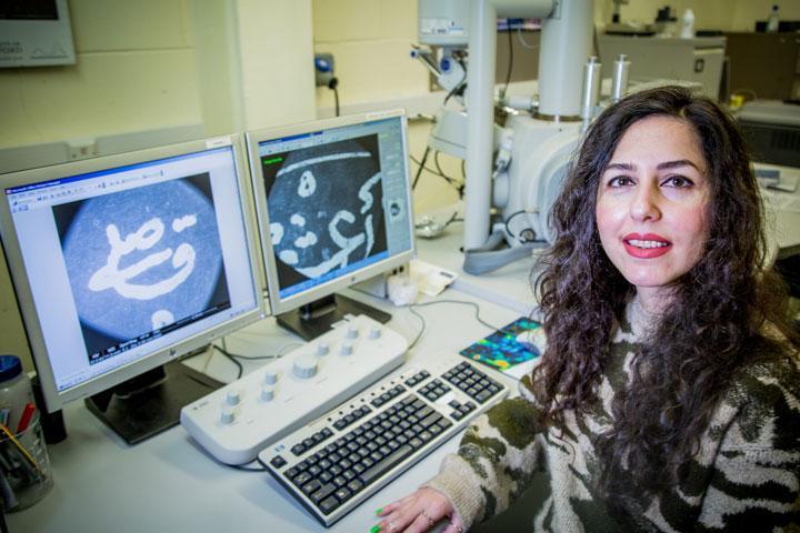 Maedeh Darzi, Archaeological Sciences student working with computers in a lab