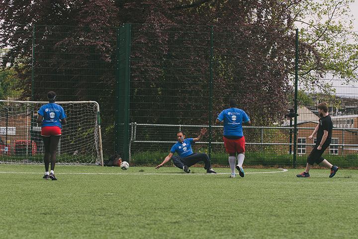Students playing 5 a-side football on the Unique outdoor football pitch