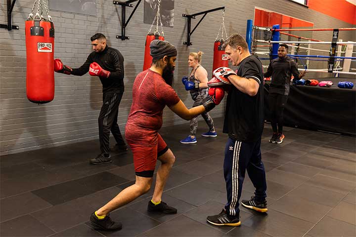 Class in boxing fitness circuit session
