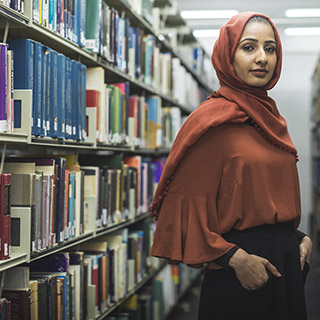 A University of Bradford student in the library